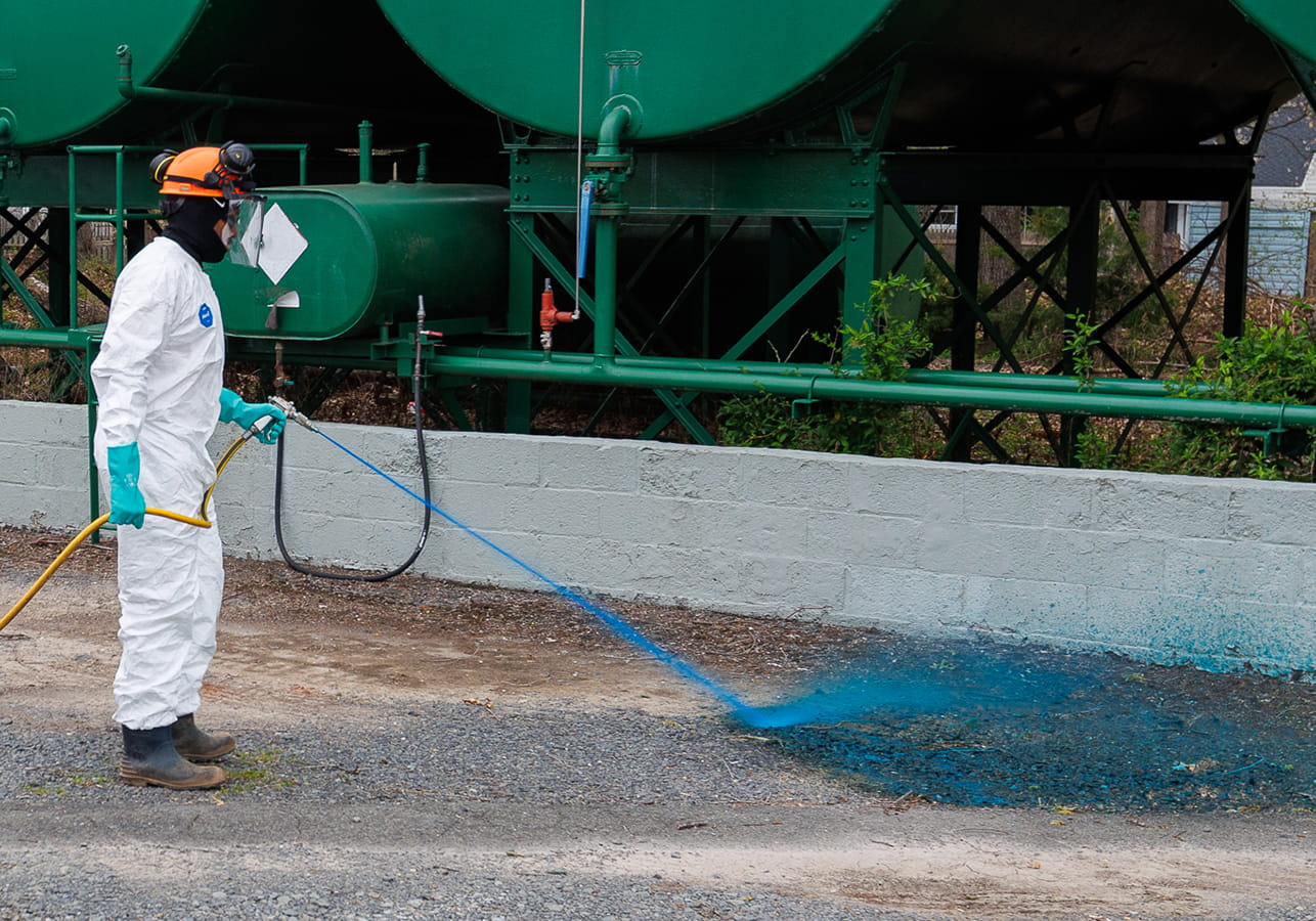 Commitment to job site safety in New Jersey by Northeastern PMC Commercial grounds maintenance team with safety gear in New Jersey